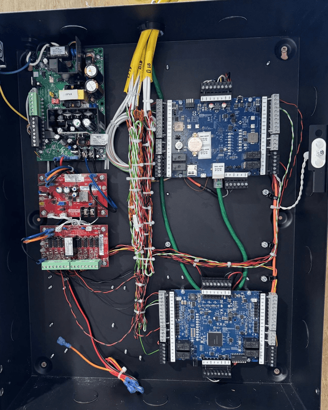 LVEC access control panel with neatly bundled, labeled wiring